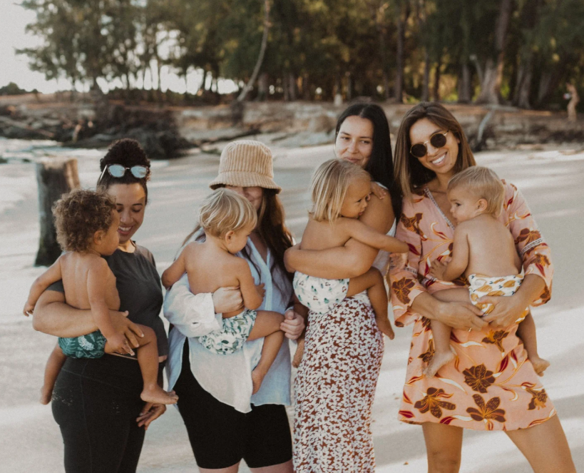 Moms with kids on the beach