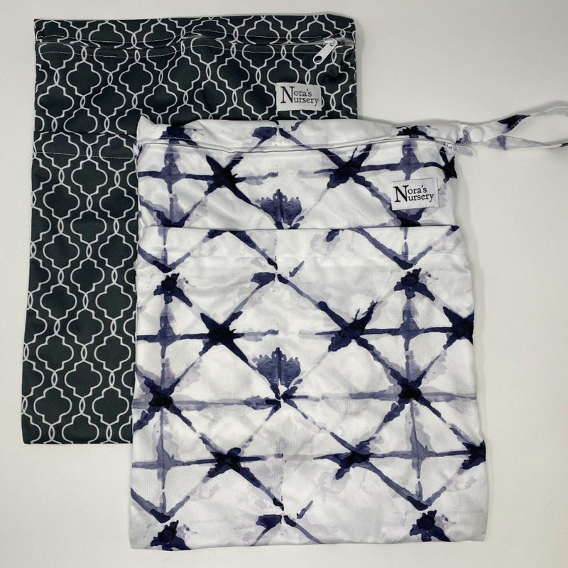 Nora's Nursery is proud to offer this 2 piece set of our stylish, eco-friendly, reusable cloth diapers bags.